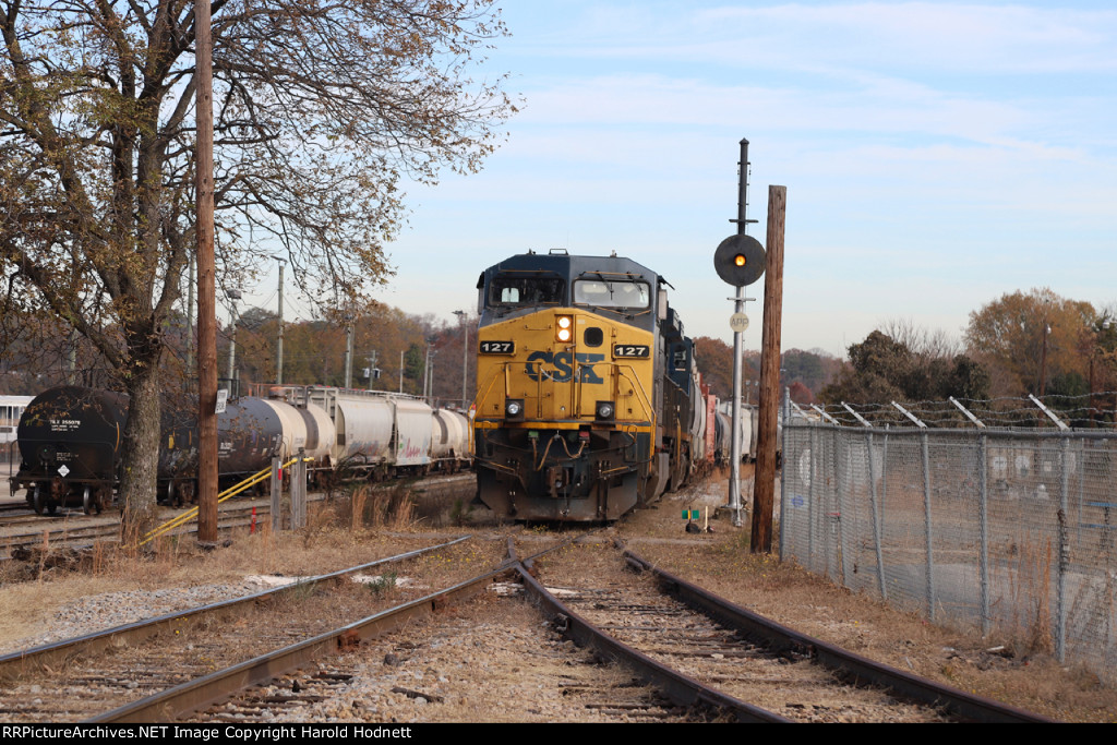 CSX 127 & 7002 are power for train L619-30, outside the yard office